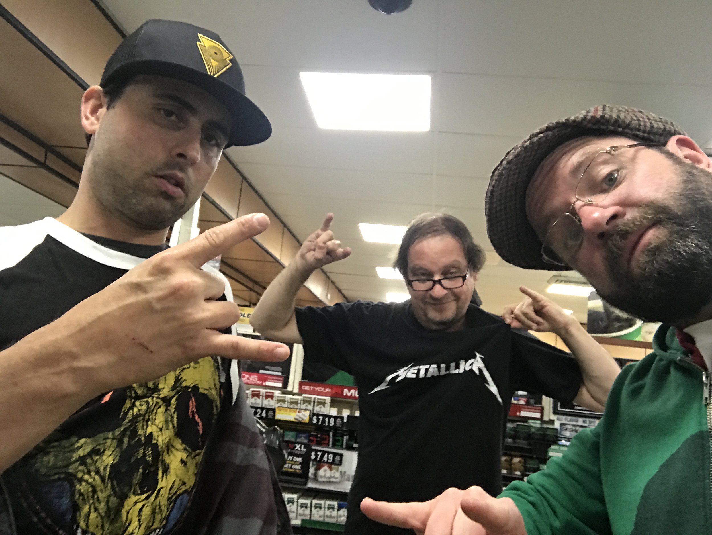 A quick Brace Road Sev stop on the way home in South Jerz revealed our favorite longtime clerk, coincidentally wearing an appropriate shirt. Granite's personal postscript/two-cents: First thing I noticed when we were standing like sheep in that enormous cluster-fuck of a line, trying to get down to row five (when all we had to do was scamper down to the next set of stairs - esp since out seats were closer to that side anyway) was how crisp and hard-hitting the low end was. When u play as fast and staccato as they do, if there are no balls behind it, it sounds all tinsel-y and hollow. Trujillo and Lars had elephant testicles. In line, from about 100 yardsaway, through a narrow doorway and about 500 bodies, my heart was still rattling in my chest as they were getting warm with a few tunes I didn't really recognize. For me - like most other bands - if the song is from an album that came out after 2001 or 2002, I don't know it. I'm not saying that's a good thing, but that's just a fact. So, it sounded great, despite the fact that I didn't know the tunes. After we woke up and cut over to the next set of stairs (like we actually were capable of independent thought), and were out from under the concrete and steel that had been over our heads in the corridor, my heart was no longer rattling, it was exploding with fierce low-end pulses. Despite instantly realizing that the mix and overall sound was going to far exceed expectations, and despite cutting free from the unnecessary mass of drunk Philly meatheads seemingly all trying to funnel down one stairway, we still weren't yet able to turn our full attention to the four-enormous vertical high def screens that served as the primary stage set up/theatrics for this tour thanks to two off-the-charts rude (straight up cunts, to be more direct) 20-something girls who, despite being in our $175 seats, acted like we were the assholes for politely asking them to move. After comparing tickets, pointing out that they were in the next section down, asking politely a second time to move so we could stop causing a distraction for the people around us, needlessly showing my ticket to another girl who had nothing to do with it (although we did befriend her after, unlike most of this entitled, snot-faced generation, she offered a heartfelt apology for being wrong), I finally stopped being polite, looked her boyfriend right in the eye and told him to get his girlfriend and get the fuck out of our seats before I curb stomped his cute little hairless face. They moved! And not a second to soon, as the soaring opening notes and thunderous drum beat of For Whom the Bell Tolls - Duke's #1 request on the night, and a fitting launching point in a city that houses the Liberty Bell - rang out over the Linc. The rest of the show, for me, was flawless. The One>Master>Fade to Black trio right in the middle of the set was the anchor for a show that greatly surpassed expectations, ever for a fan who truly loves this band. It is very impressive that four dudes that age can still bring that level of heat and intensity to a crowd of 50k+, play nearly flawless, highly complex, lightning fast rock & roll compositions so well, and leave the crowd wanting more after two hours of pure power. A truly special night with two of my dearest friends and real fellow music lovers that will not soon be forgotten.