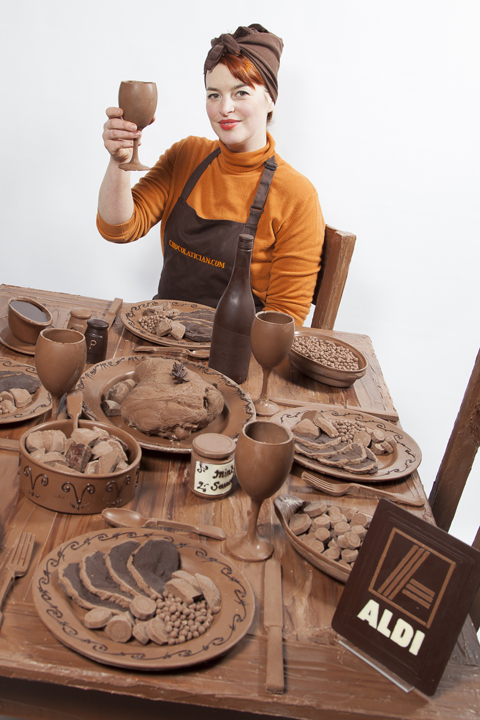 Chocolatician sitting at the Aldi Easter Chocolate table