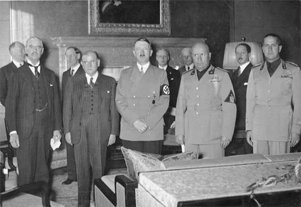 From left to right Chamberlain, Daladier, Hitler, Mussolini, and Ciano pictured before signing the Munich Agreement, which gave the Sudetenland to Germany.