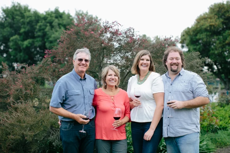 Family enjoying a vineyard stroll