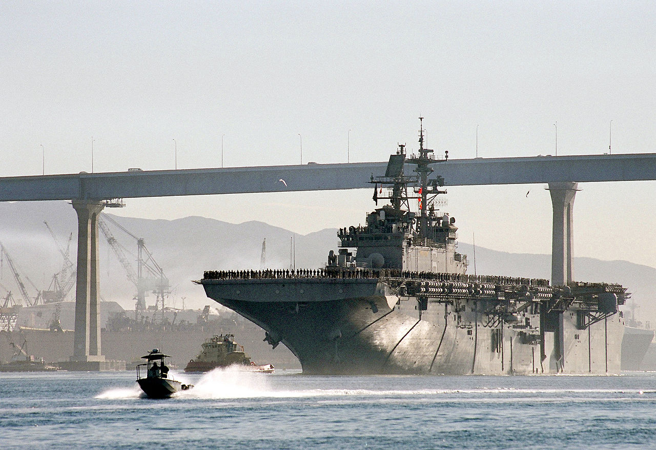 Aircraft carrier going under bridge - public use.jpg