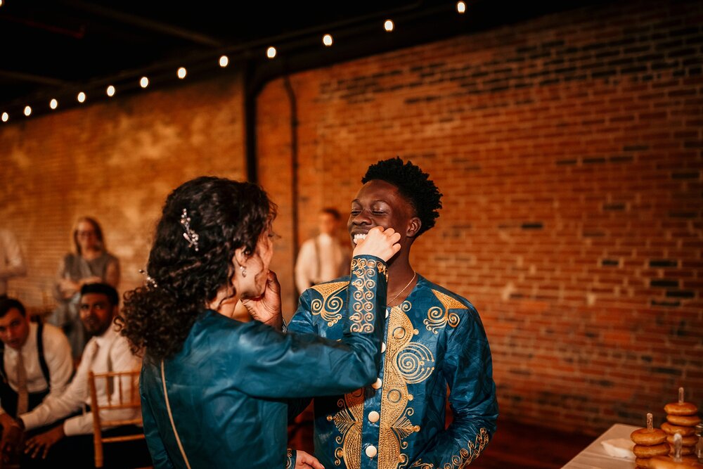  Dominique and Nemuel changed into traditional attire for some parts of their reception, like the cake cutting! 