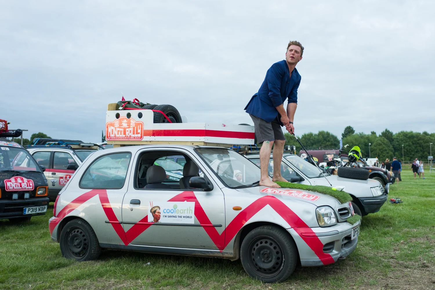 Rallier Liam Thorpe, putting golf balls off his car's hood