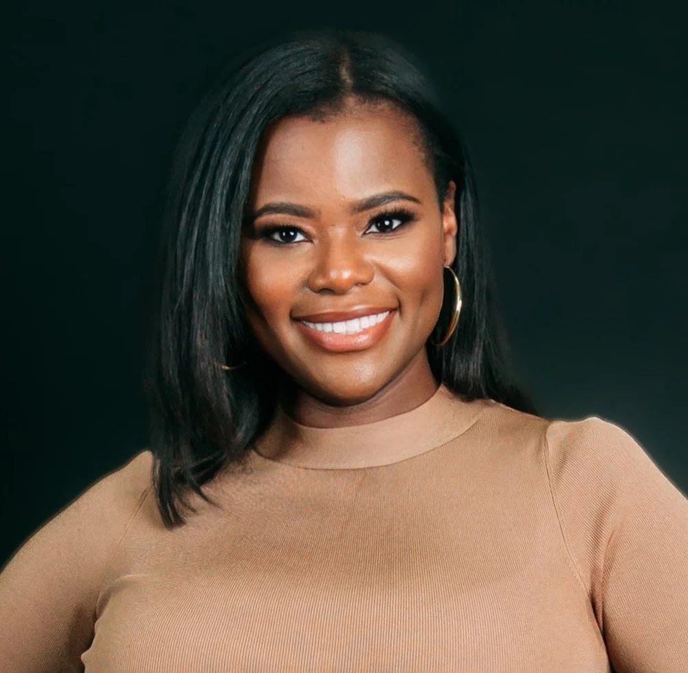 Headshot 2022 arm.JPG