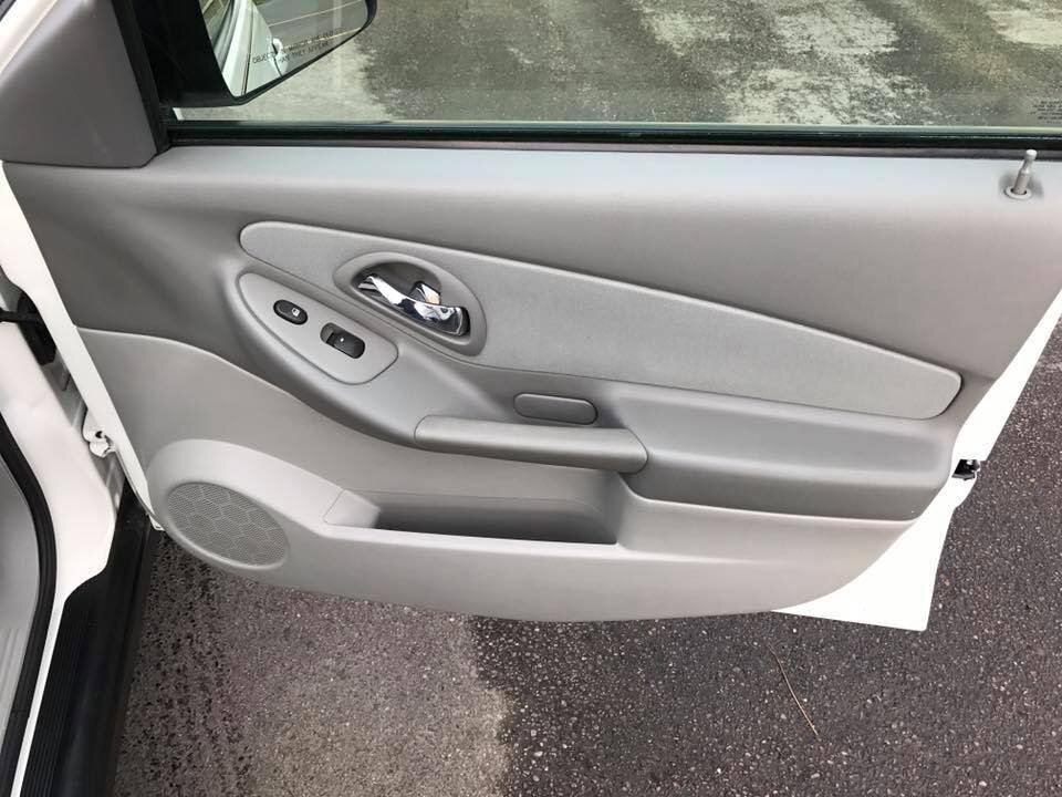 Clean door after inside auto detailing at VEI
