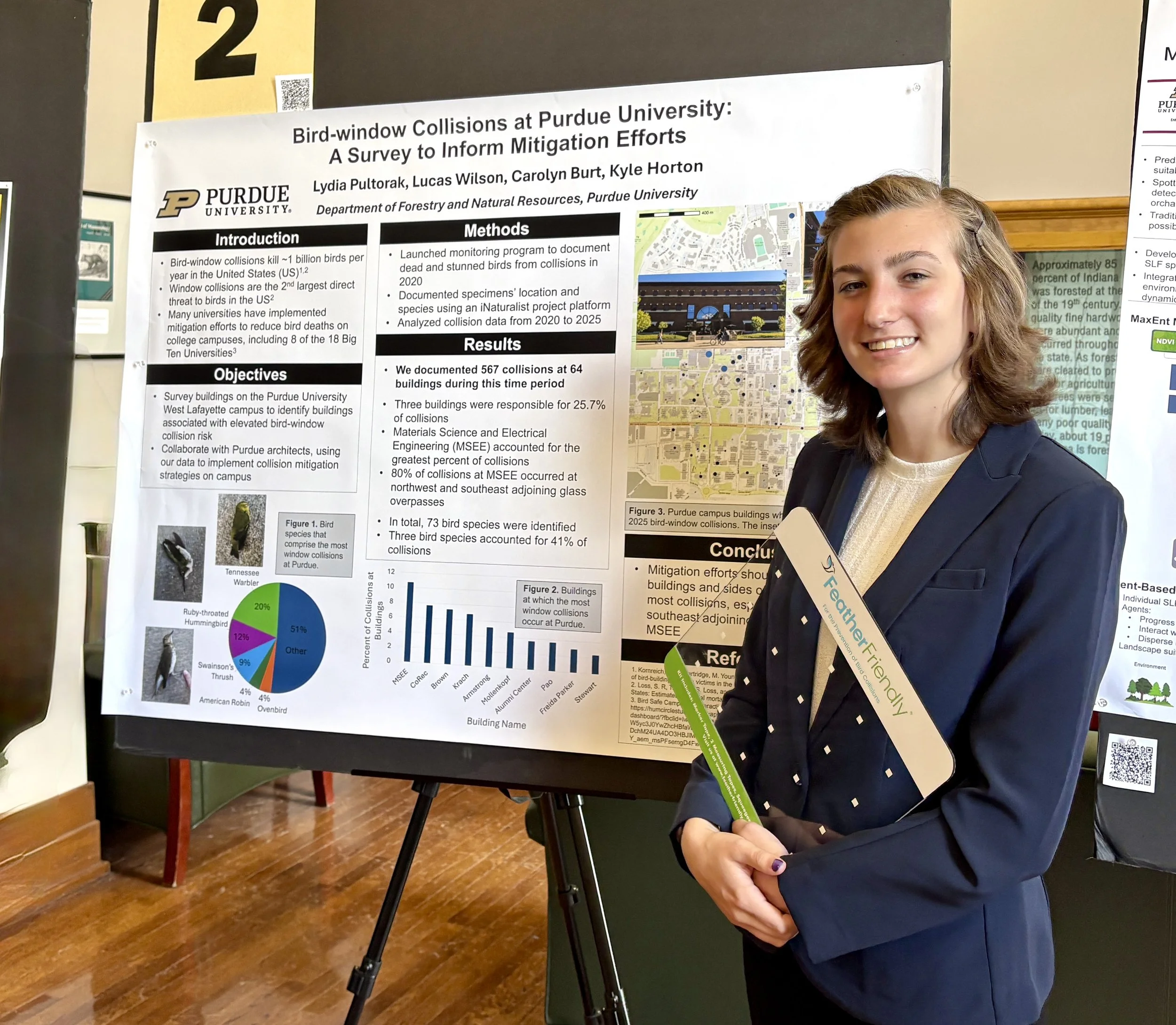 Lydia delivers excellent poster advocating for glass retrofits on Purdue campus to reduce bird collisions.