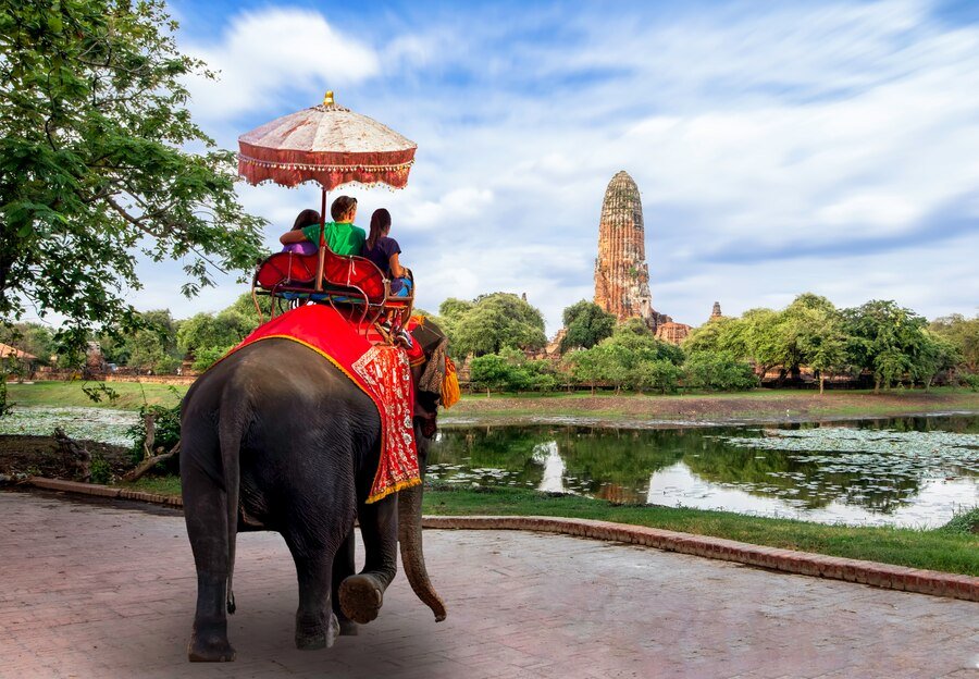 foreign-tourists-elephant-ride-visit-ayutthaya-there-are-ruins-temple-ayutthaya-period-concept-is-travel-temple_39733-436.jpg