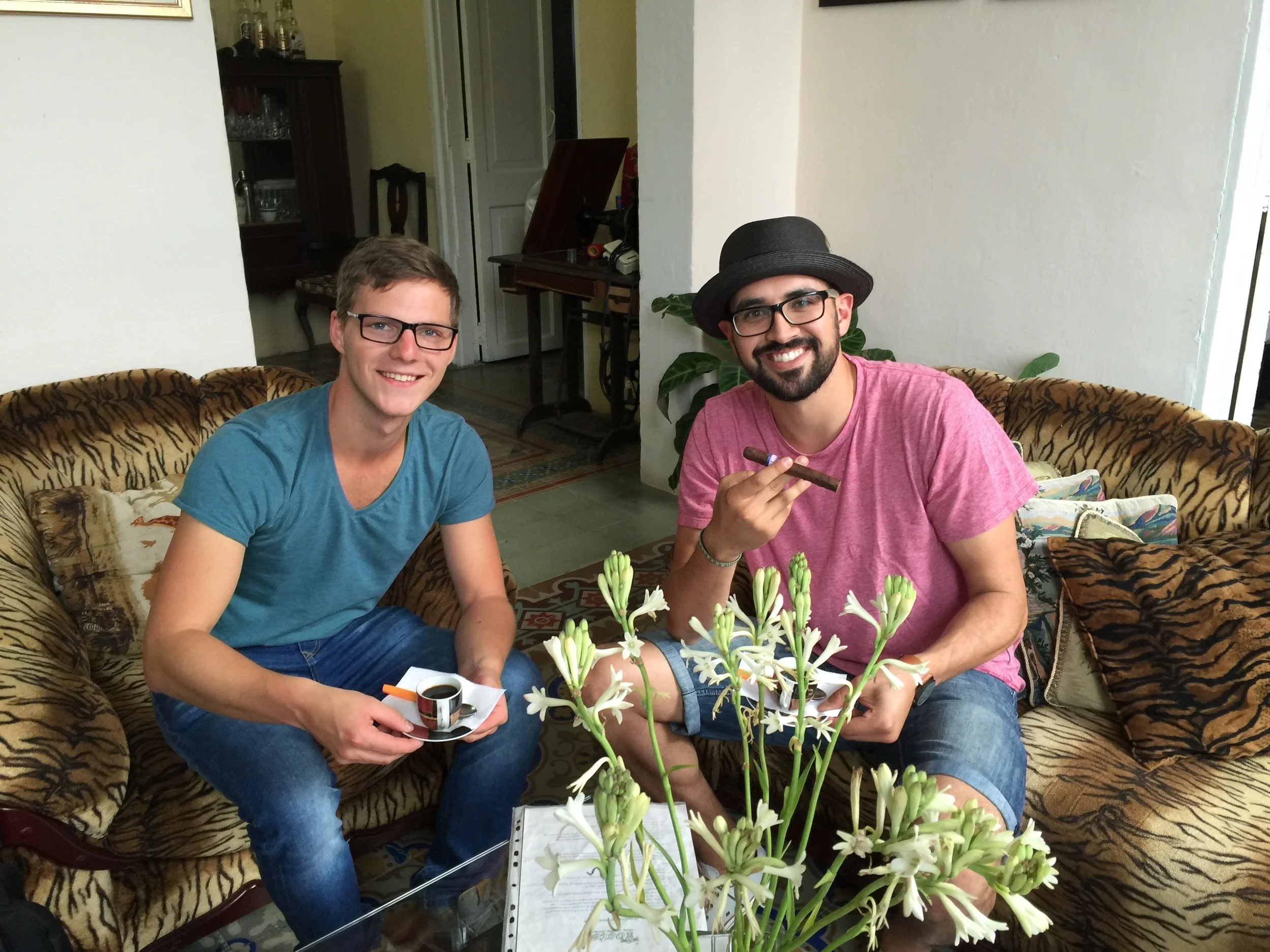 My German friend Manuel and I enjoying our first Cuban coffee and cigar at our hostel in Havana. 