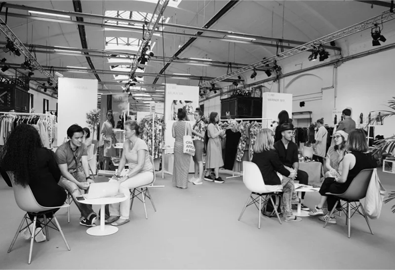 The Ethical Fashion Show and Greenshowroom at Postbahnhof in Berlin. Top: LOCATION © THOMAS LOHNES / GETTY IMAGES / MESSE FRANKFURT, centre: fashion shows at Ethical Fashion Show/Greenshowroom by Studio Elsien Gringhuis (left) and Cocoon (right), bottom: exhibition view.Photography: JUNI 2016 © YANNIS VLAMOS / MESSE FRANKFURT and JUNI 2016 © PHILLIP ZWANZIG / MESSE FRANKFURT