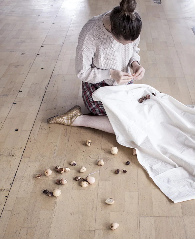 Top right: Shoes made out of birch. Below: Iulia in her studio.
