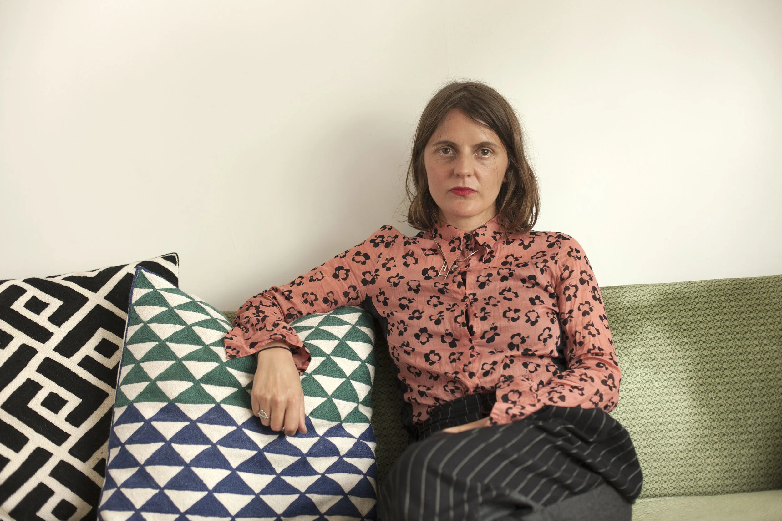 Noemi wears a pair of trousers by Stella McCartney, a Dries van Noten shirt, and her own jewelery.