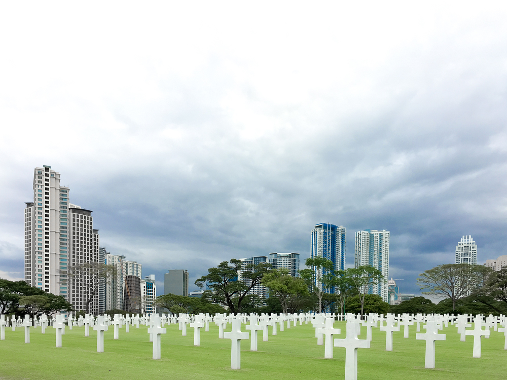 View from another reading spot. These buildings at BGC act as backdrop for these tombstones.