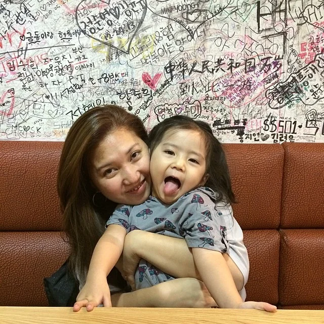 Me with 3 y/o Erin somewhere in Seoul.