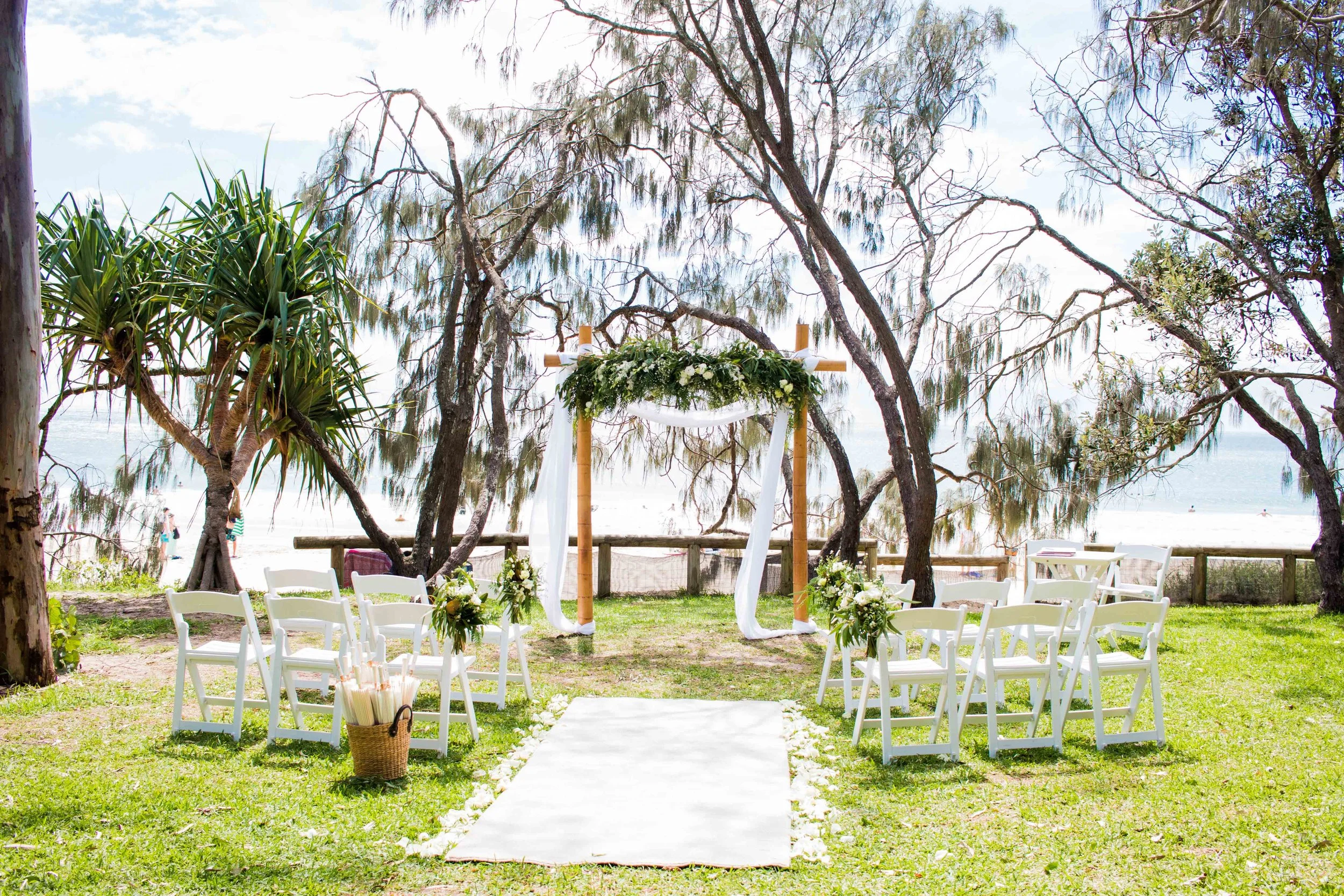 Hidden Grove ~ Noosa Foreshore. Celebrant and Styling Package which includes the above styling décor scene (white and green florals) = $2,320 total cost inclusive of delivery, set up and pack down. Your choice of seasonal flowers which are yours to keep after the ceremony service. Please visit 'Natalie Skye Celebrant' Instagram page for more styling décor inspo.