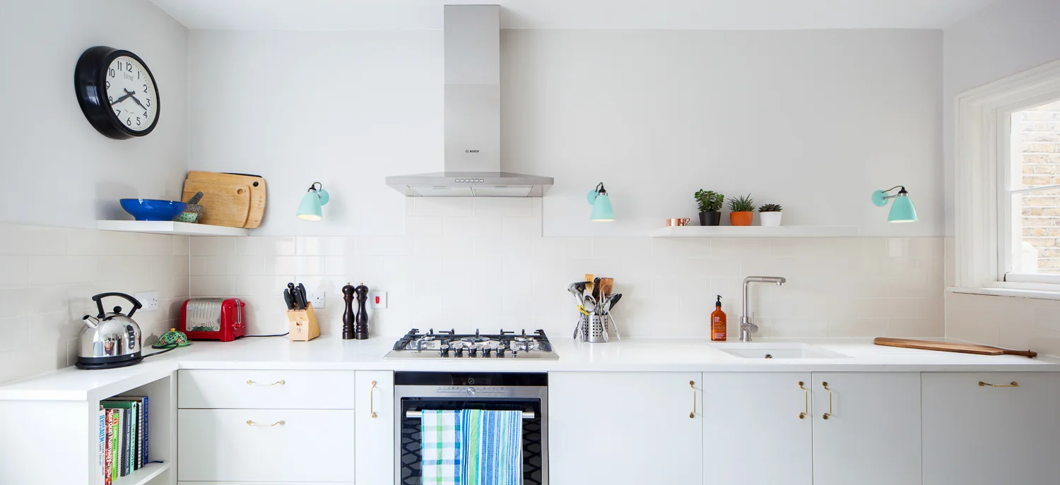  The Quirky punches of colours bring a white backdrop kitchen to life. 