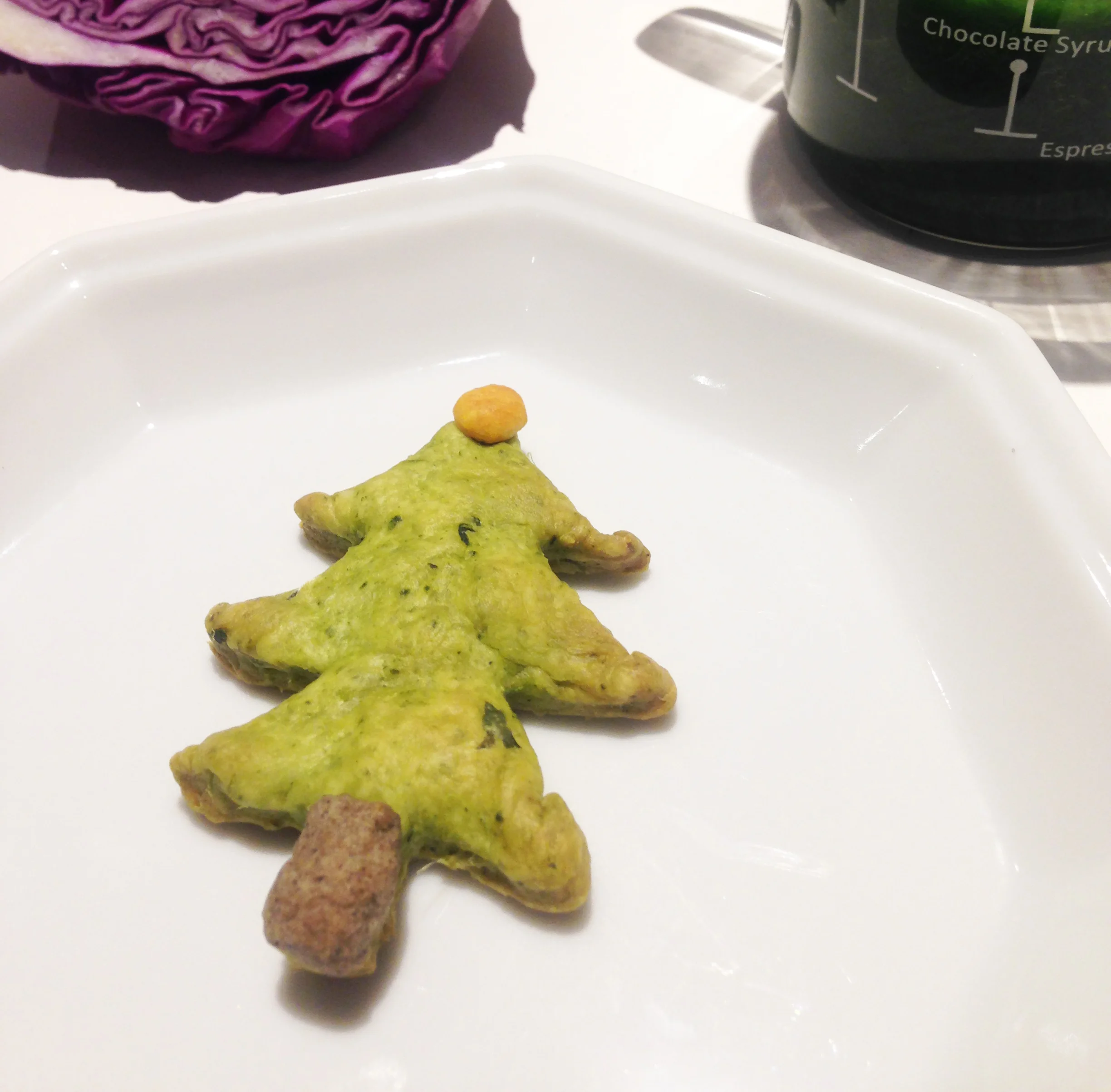 Cookie made of different colored vegetable dough