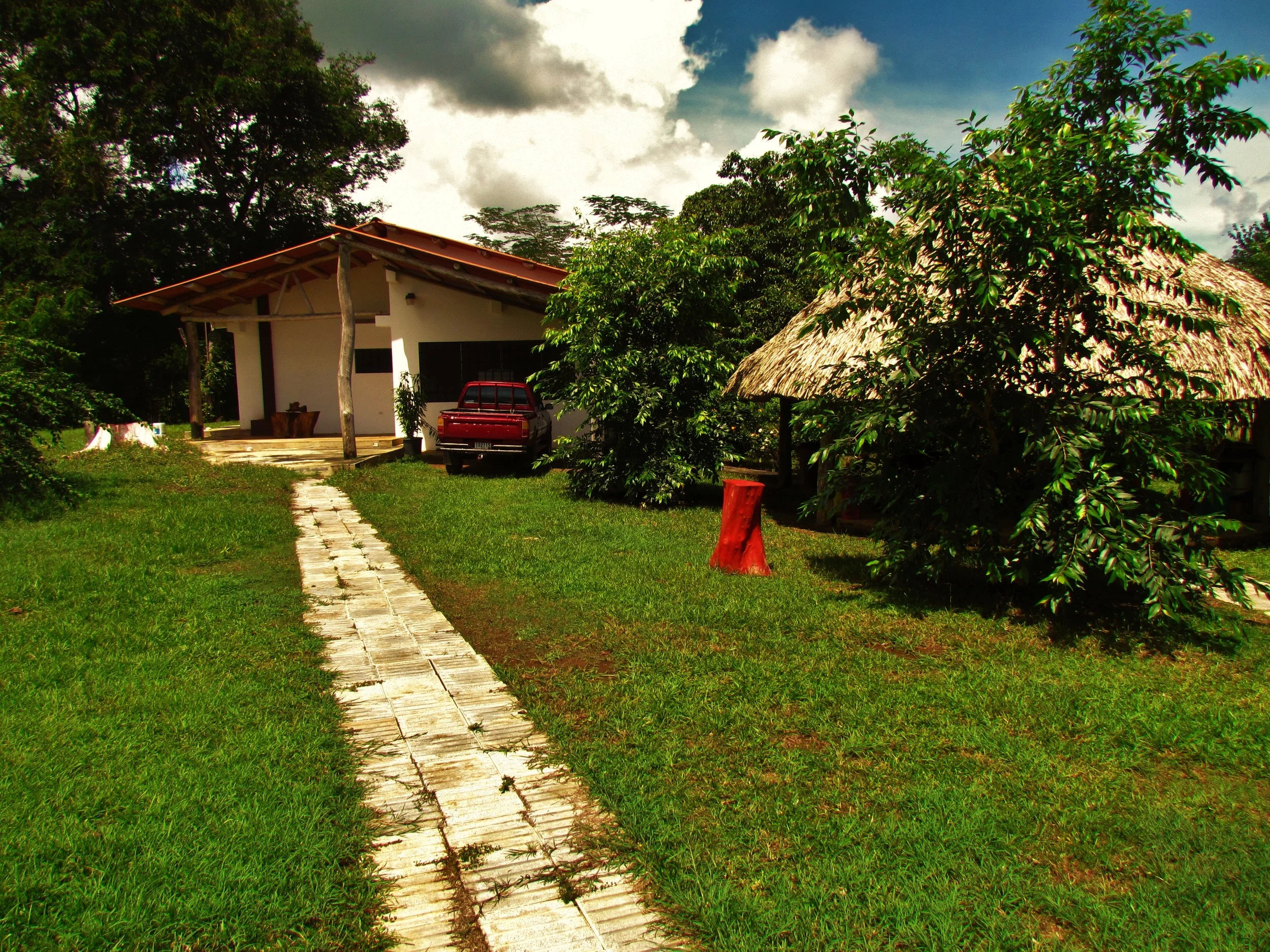  The older of the two homes that come with the property. &nbsp;Done in a "rustic" style, it is a simple, but comfortable home with electricity, piped water, and all the essentials..&nbsp; 