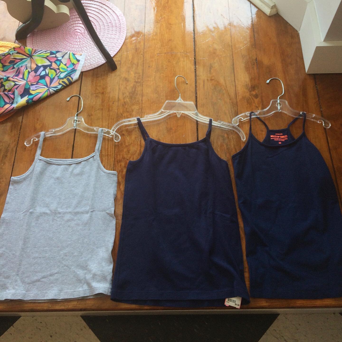 Comfy camis in! Grey #hannaandersson cami size 10/12 &amp; $9.99. Navy cami in the middle #hannaandersson  size 14 &amp; $9.99. Navy cami on right size #crewcuts size 10 &amp; $8.99.  #529hh #529hhfaves #529hollinhall #kidsconsignment #consignment #b