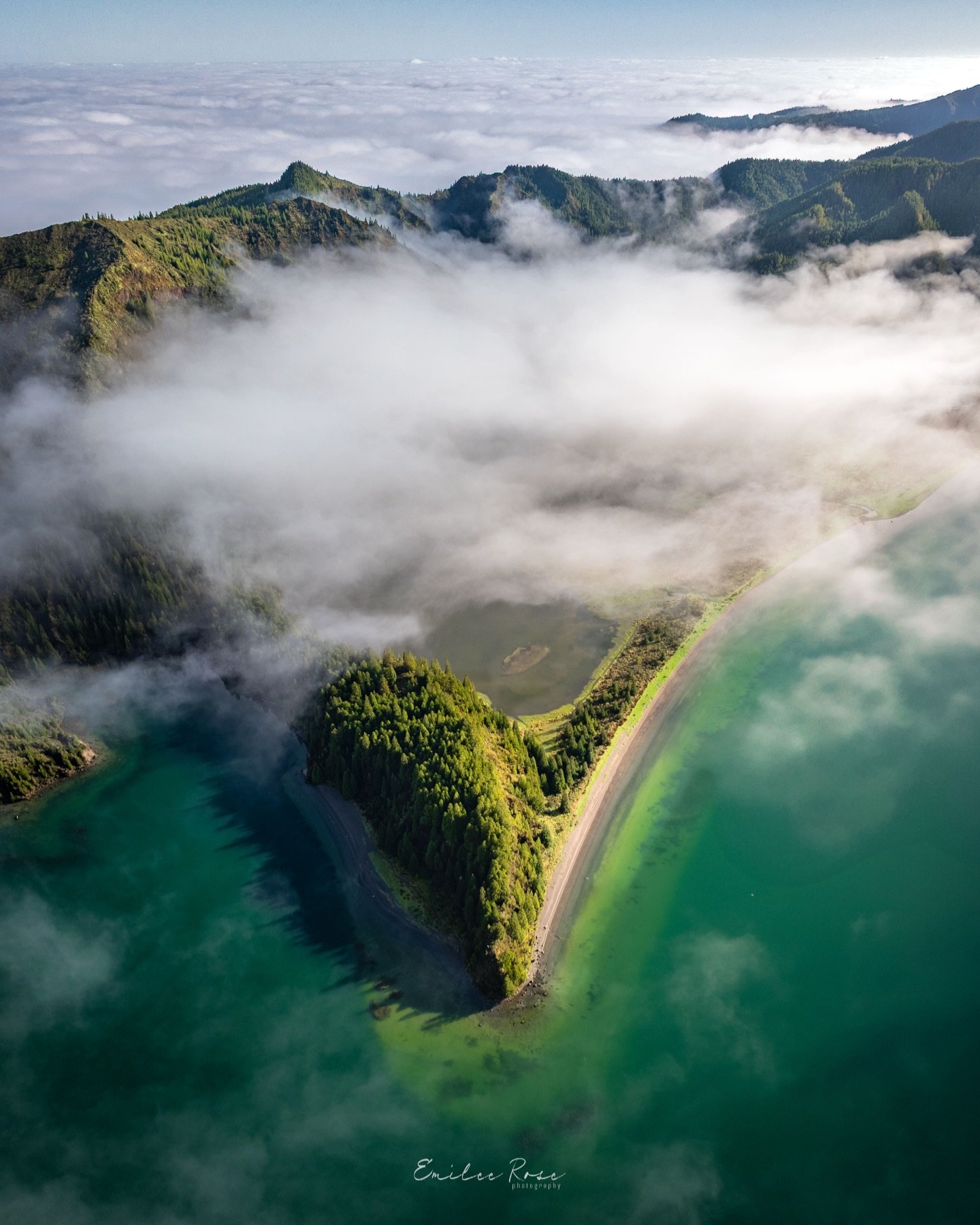 &ldquo;Cloud Harbor&rdquo; 🌅

Turqoise waters under the rolling clouds, taken in Lagoa do Fogo, The Azores, Portugal📍

Follow ➡️ @emileerosephoto for more 📸

Visit www.emileerose.com or the link in my bio to see other work 🙂
. . . #dji #mavic3pro