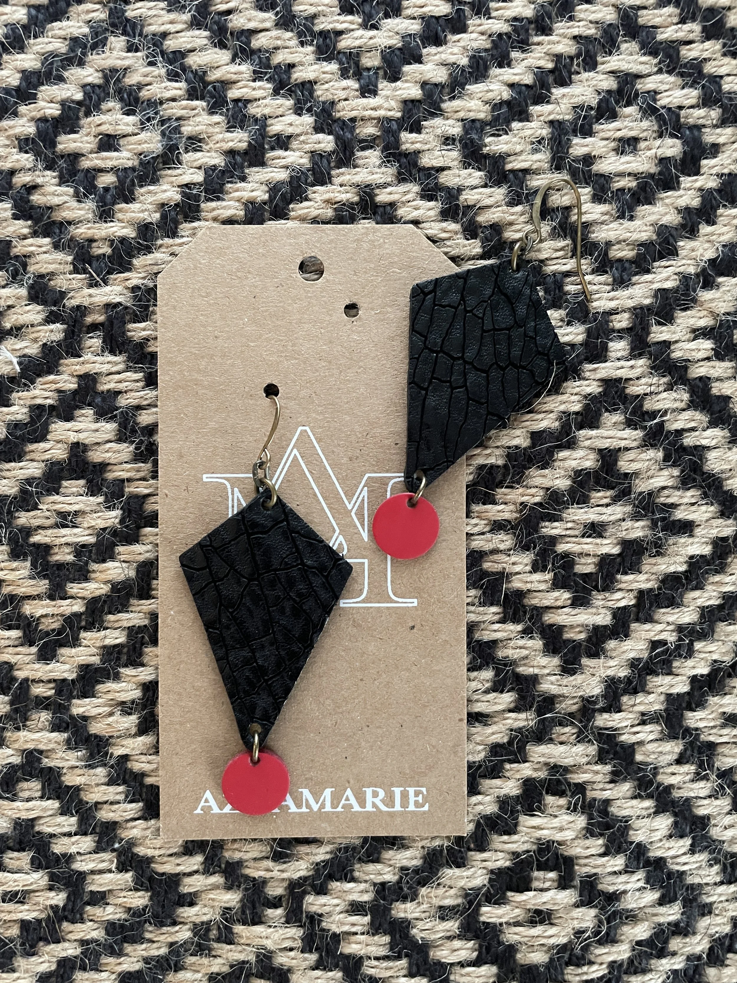 Black textured with Red Dot