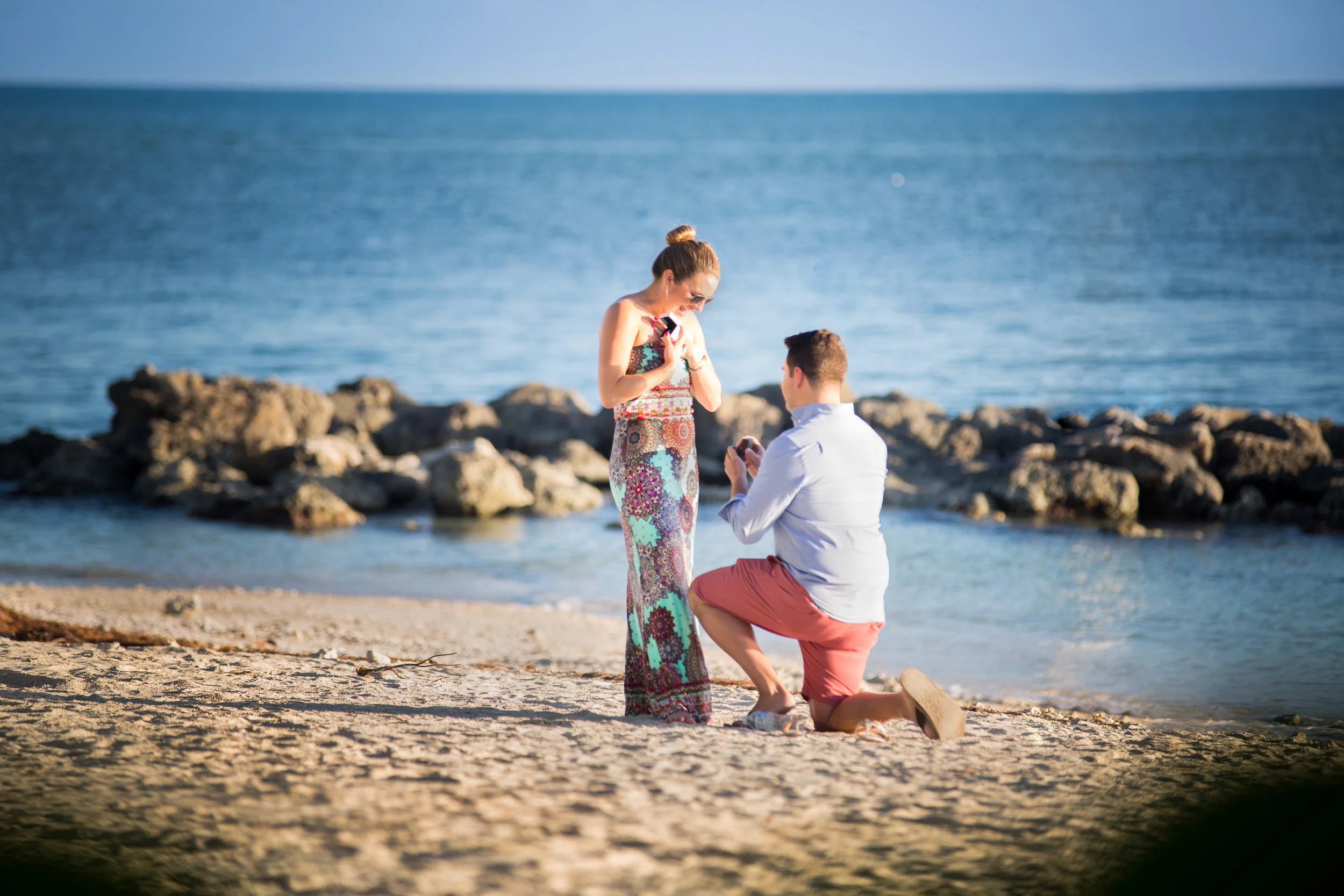 Mike going down on one, armed with the ring and asking Sarah to marry him.