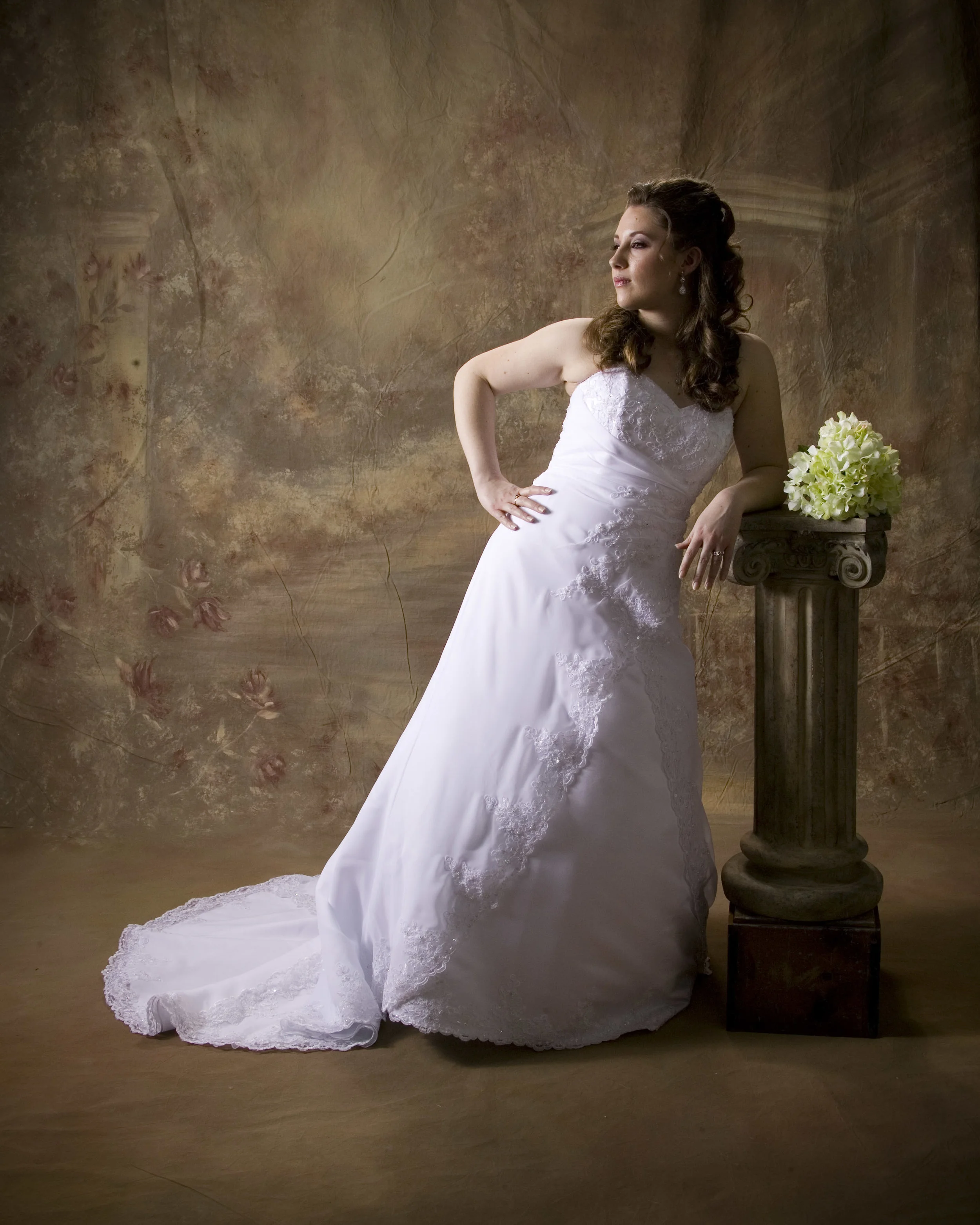 Portrait-Of-Bride-Against-Artistic-Studio-Background.jpg