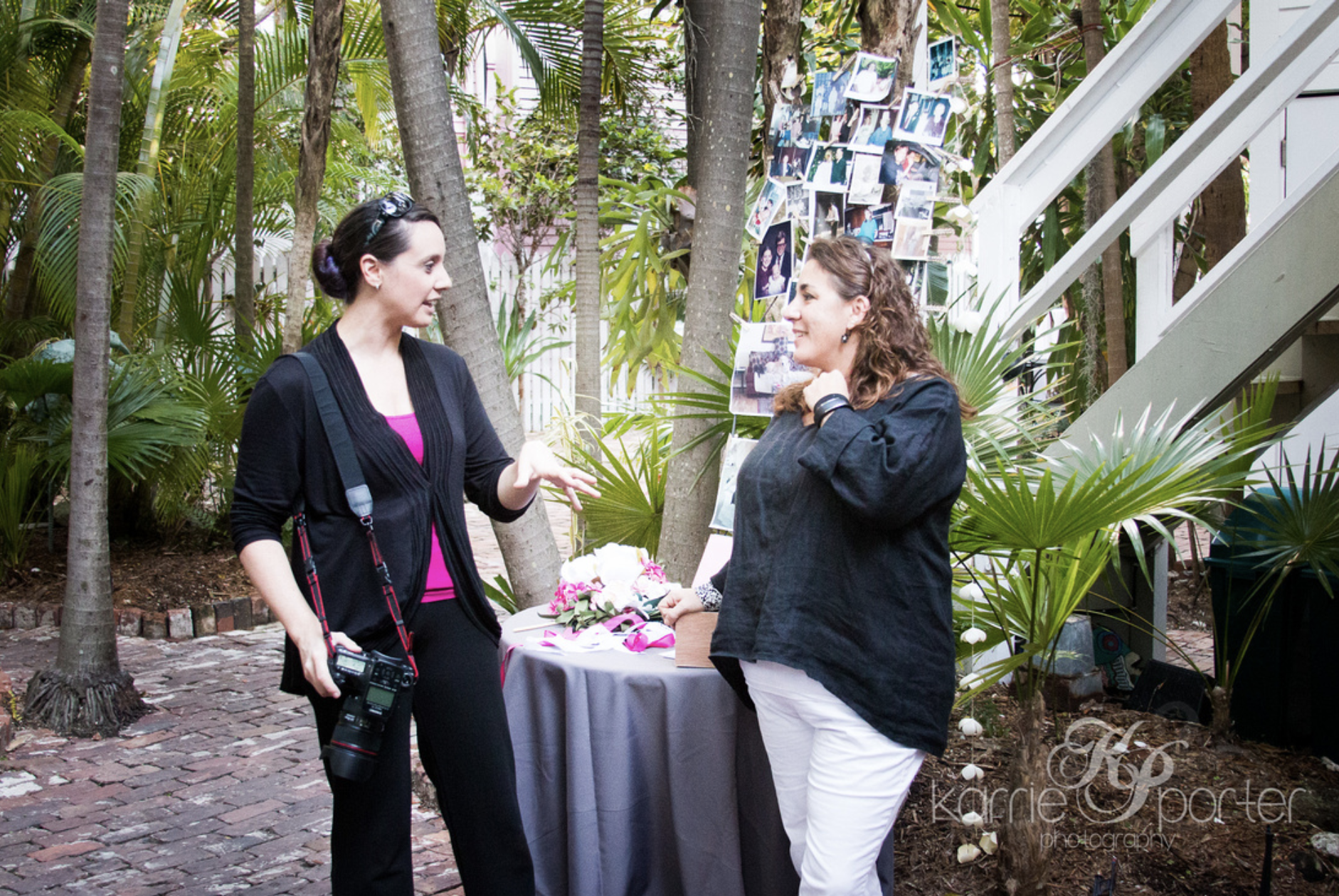 Local Key West Wedding Photographer Discussing With Planner from Simply You.png