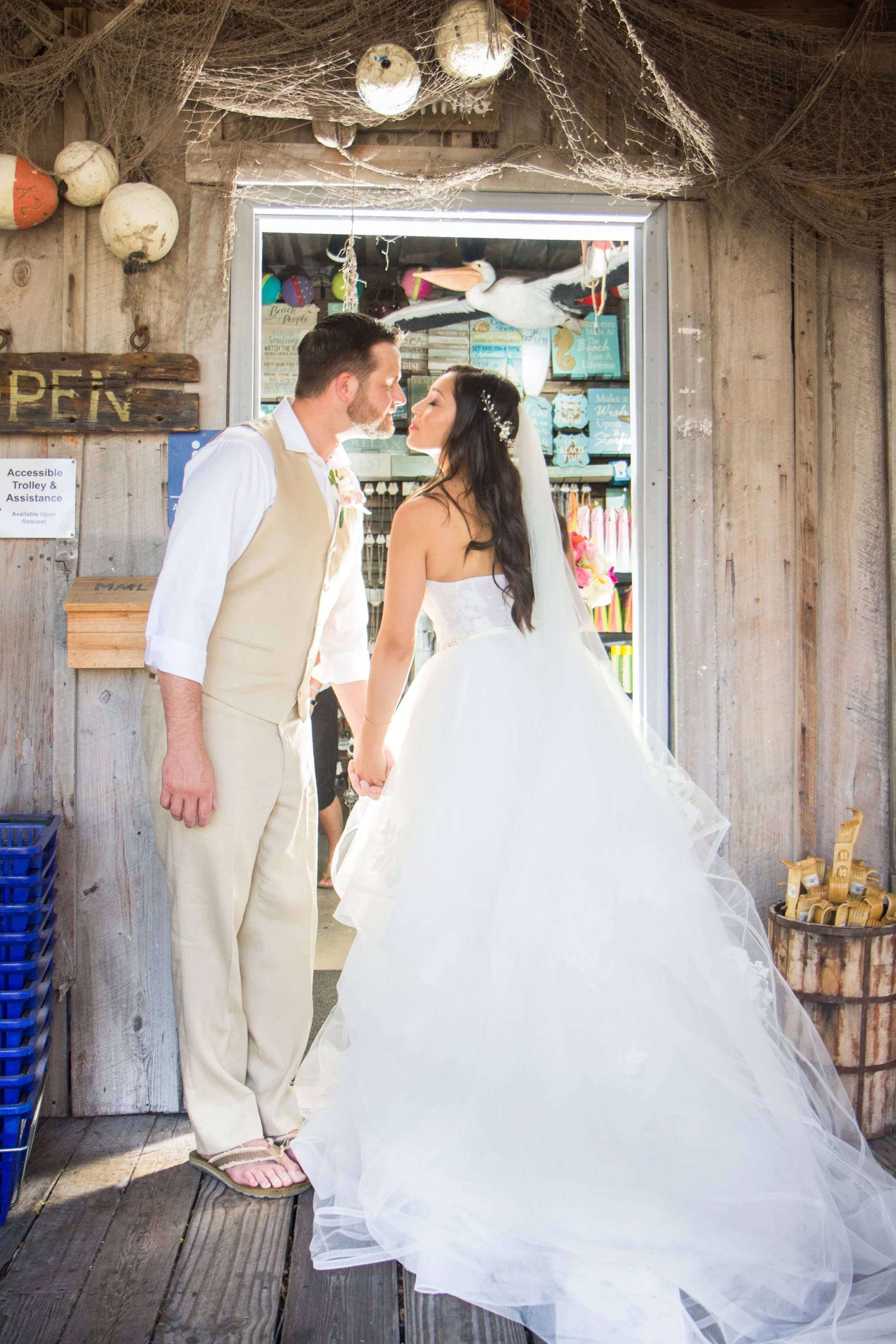 Kissing in the doorway at Macs Sea Garden in Key West