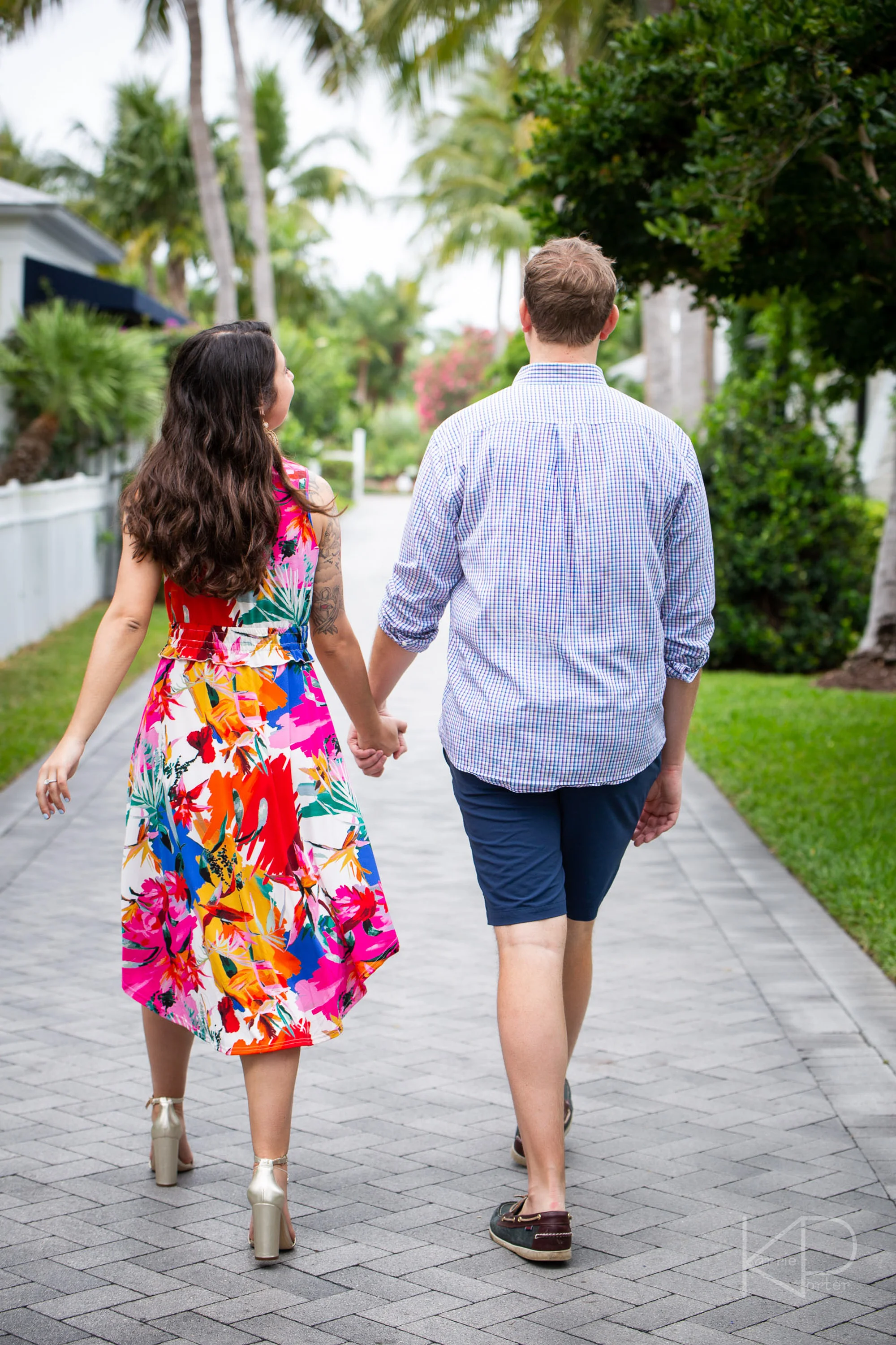 Couple gets engaged during undercover proposal photo shoot on Sunset Key private island at Crescent Beach off the coast of Key West Florida