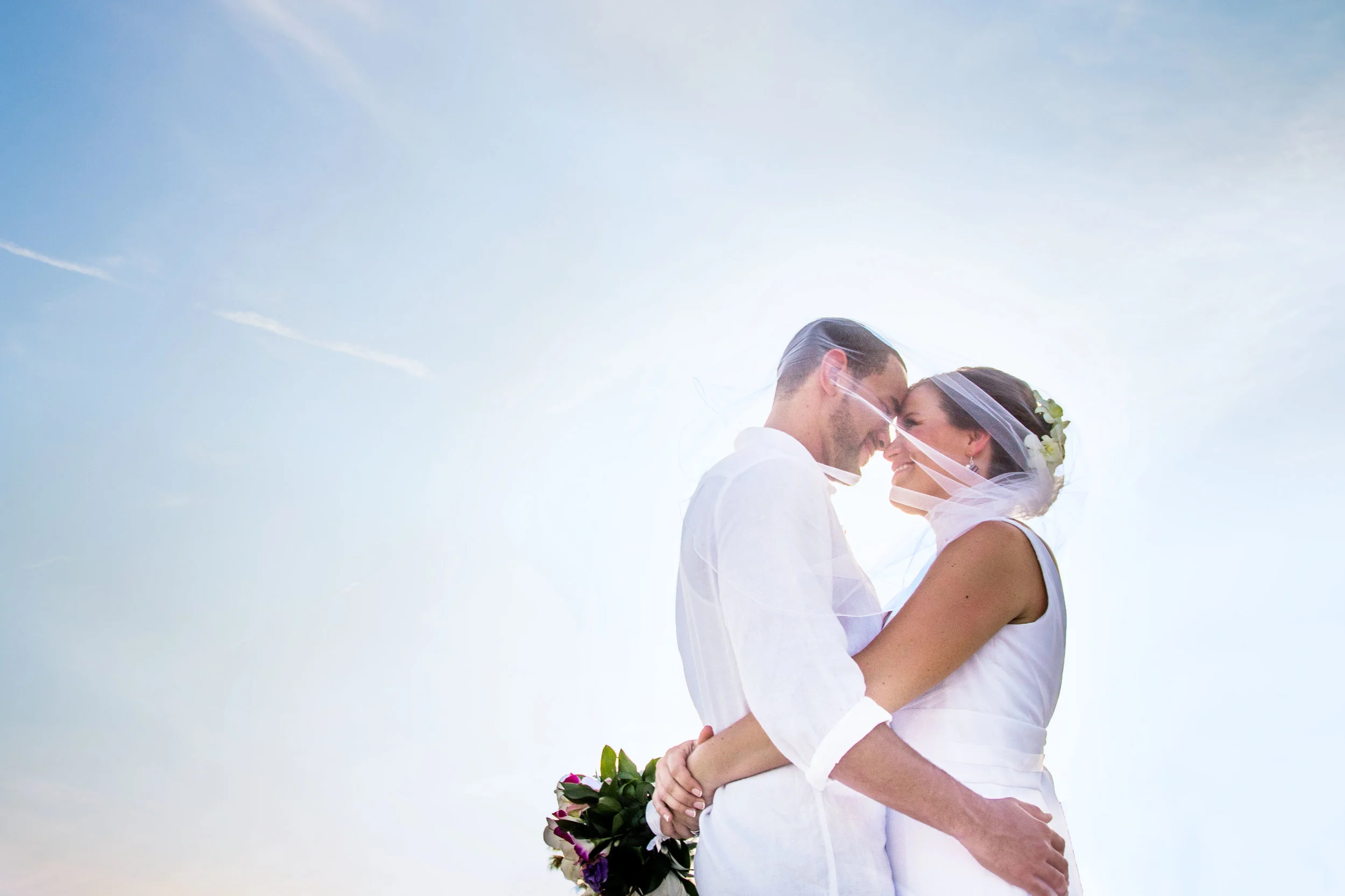 Bride and Groom Pose Forehead to Forehead on Beach in Key West