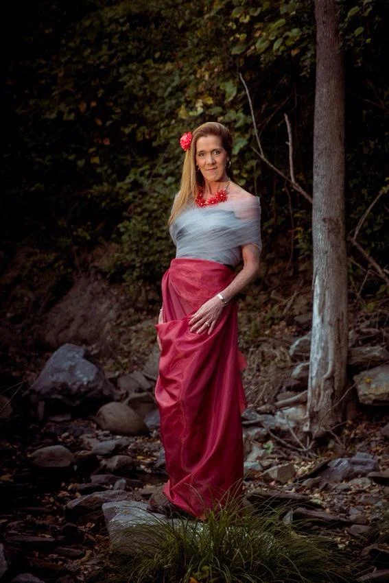 Mom in red next to creek.jpg