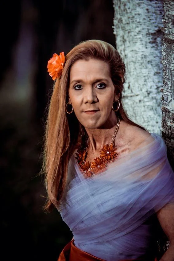 Mom in tulle wrap dress next to creek.jpg