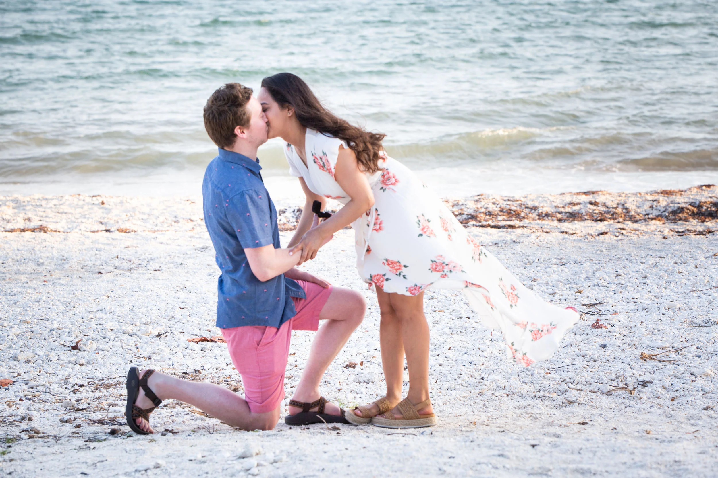 Engaged couple popping the question on the beach of Key West.jpg