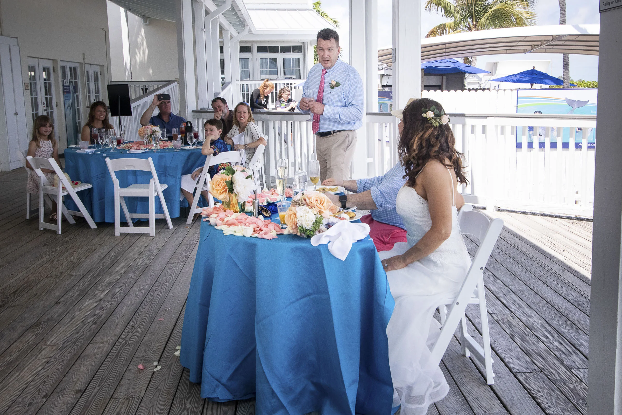Couple receiving toast from best man.jpg