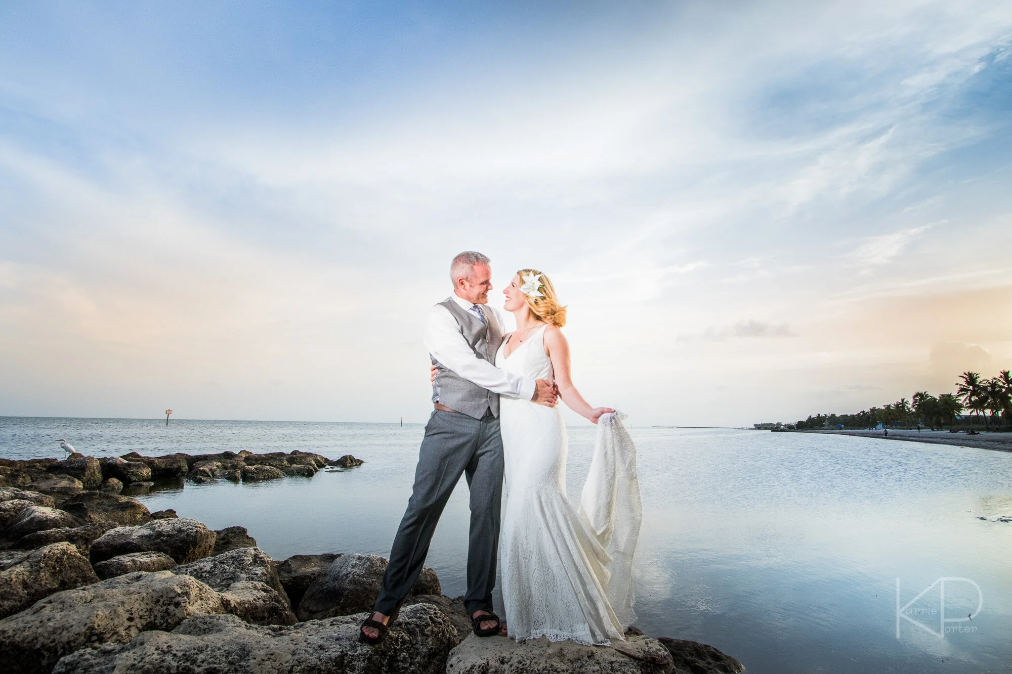 Bride and groom posing in historic building in Key West