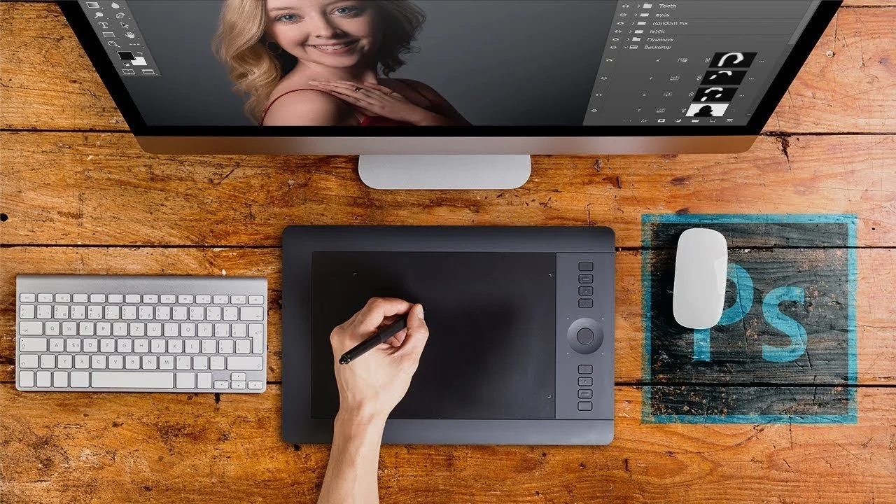 photographer editing on imac and tablet.jpg
