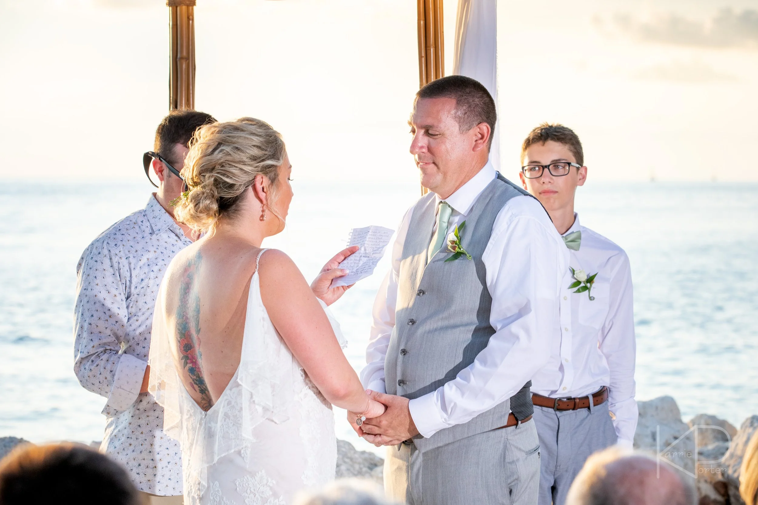 106-BLOG_Corbishley--Wedding-beach wedding, bride, covid reschedule, destination wedding, fort zachary taylor, groom, key west wedding, wedding ceremony.jpg