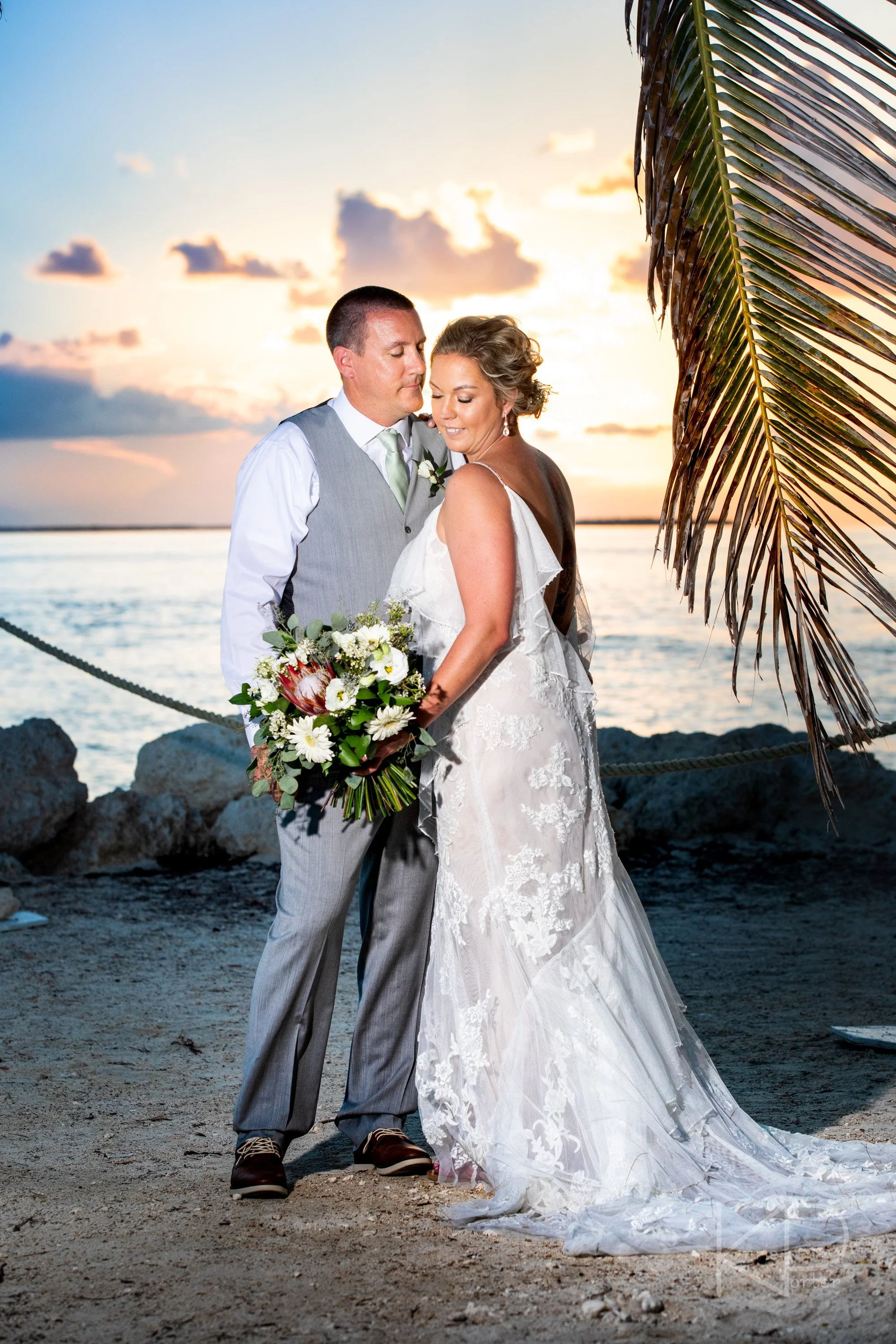 133-BLOG_Corbishley--Wedding-beach portrait, beach wedding, bride, couples portrait, covid reschedule, destination wedding, fort zachary taylor, groom, key west wedding, sunset portrait.jpg