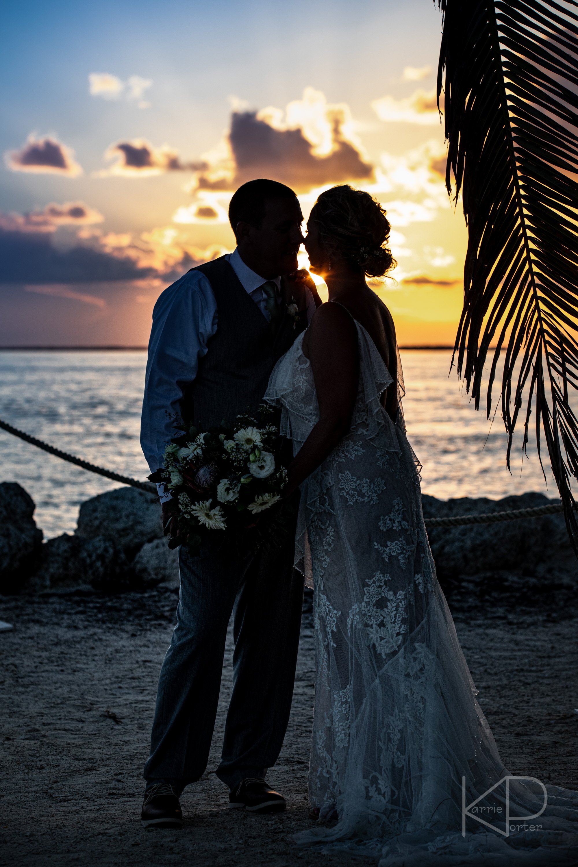 131-BLOG_Corbishley--Wedding-beach portrait, beach wedding, bride, couples portrait, covid reschedule, destination wedding, fort zachary taylor, groom, key west wedding, sunset portrait.jpg
