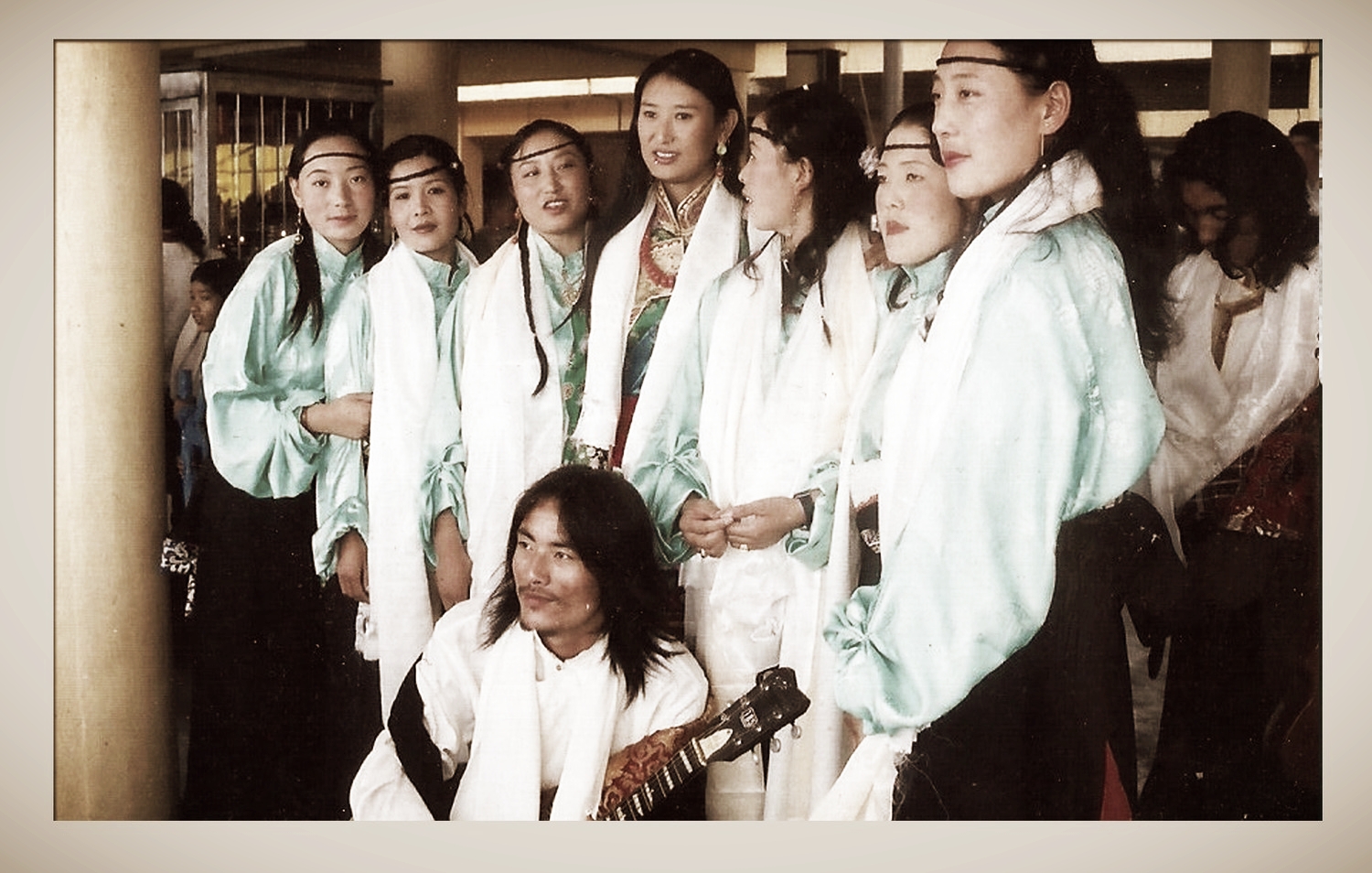 After graduating from TTS, I joined the Akupema group which was a Tibetan performing arts group which toured the whole of India. Whilst in Akupema I performed as a singer, dancer and musician. Performing with Akupema, I became more and more skilled at my instruments. However, Akupema didn’t last long. Due to poor management of the group, members began to leave until I was the only one left and the group ceased to exist. And so I applied to the Norbulingka Institute as a modern artist. I worked as a modern artist, relief painter and music teacher. While living there I opened a hairdressing salon. This was the first modern hairdressing salon opened by a Tibetan. It was also whilst I was at Norbulingka that I opened my first tattoo shop. The skills required to be a relief painter – being able to paint a long line steadily, for example – are similar to those required for tattooing so these two skills went well together. I had actually started tattooing whilst I was part of the Akupema group. A friend in the group had created a tattoo on my arm painstakingly using a needle, and I had had the idea that it would be much better if there could be a machine to create the tattoo. So, I began working on a machine. The machine I eventually made comprised pieces from a cassette tape and ballpoint pen, and the battery pack from a keyboard and needles which I could change. And a lot of electrical tape. I began tattooing on the side using this home-made machine whilst I was at Norbulingka. I worked at Norbulingka for 2 and a half years. By the time I left, I had risen to be the main music teacher there, and I performed with my students at the 2006 Kalachakra held at Amaravati for His Holiness the Dalai Lama. After this performance I left Norbulingka and came to McLeod Ganj. It was July. For a while I didn’t make tattoos but with the help of a friend from the USA, Serena, I bought professional equipment and opened a shop. In the beginning I didn’t know how to use the modern tattooing equipment Serena had helped me buy. And so I had to learn. I learnt from Philip, a tattooist from Chicago (USA) who visited Dharamsala, and also from Claudia Fanti, another tattooist from Brazil. It was at this time that I also bought my first computer – for 3000 rs! I’d never used a computer before. After some time, I had made enough money by designing and selling T-shirts to invest in more expensive and better quality tattooing equipment, which is what I use today. (Today, vice versa is true – the tattoo money allows me to make better designed and better quality T-shirts!) My tattooing business is now very popular, and I am well-known as a tattooist-activist. I use my tattoos to make political statements about the Tibetan situation. Through my tattoos I have met people from all over the world. My work was recently featured in the London-based magazine Total Tattoo (May 2012 issue) and the German magazine Tätowier (March 2012 issue). I’ve also featured in the New York magazine Ink.