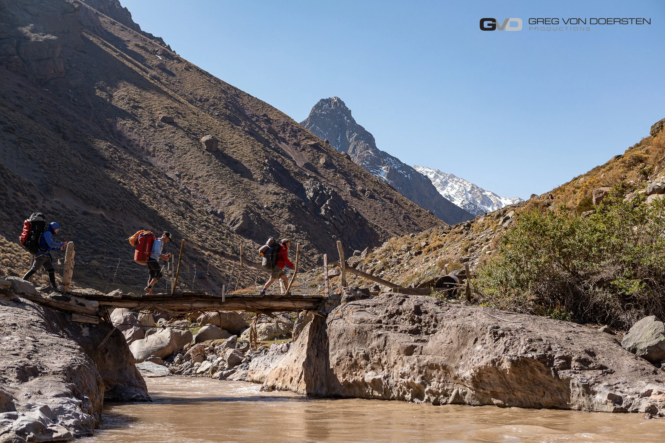 The crew shuttling gear past the first of many rivers with their first round of gear.