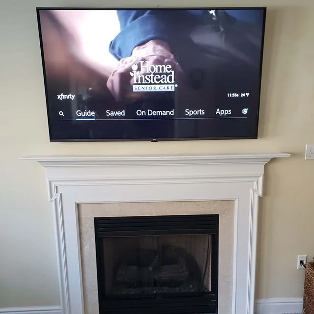 I feel like all I've been doing lately is hiding cables in walls over fireplaces, but practice makes perfect.  These customers were great people and actually had me mount two additional TV's during my time there. 
Photo 2 is the drywall patch I did. 