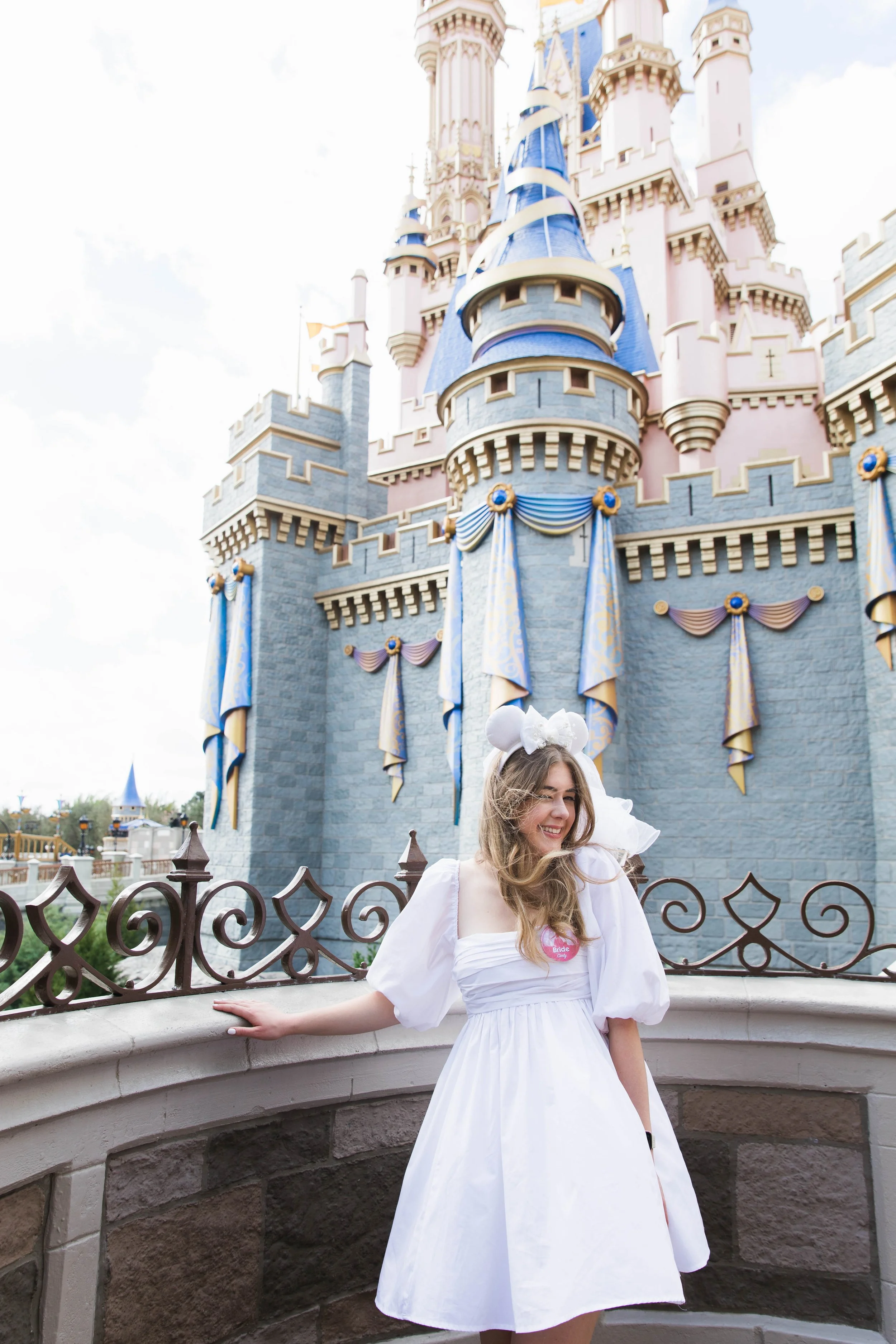 Bride to be in front of Cinderella Castle at Magic Kingdom.
