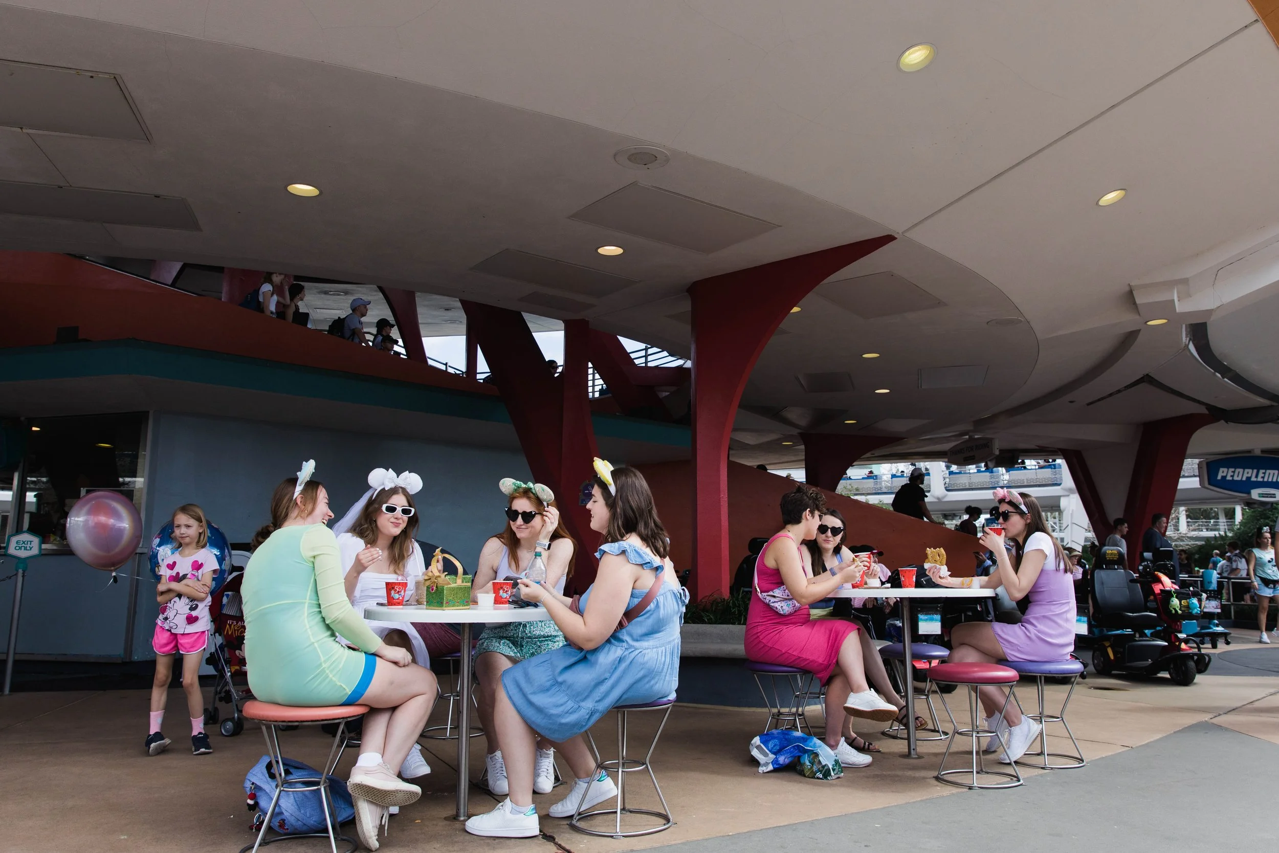 Snack break outside the Lunching Pad in Tomorrowland at Magic Kingdom.