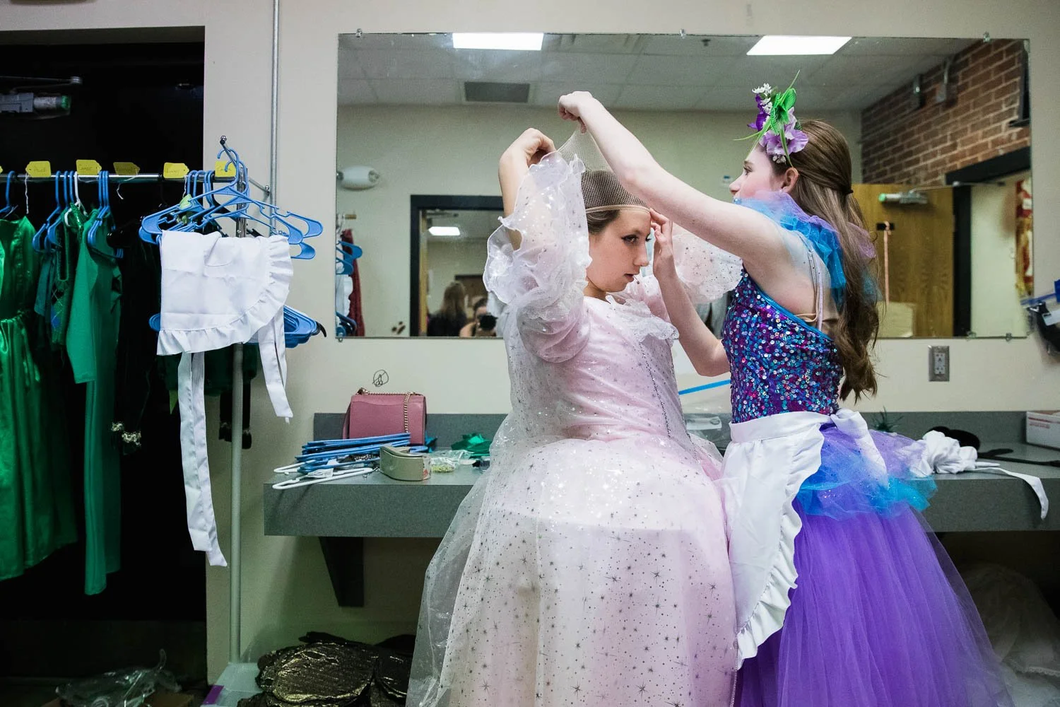 Girls get ready behind the scenes for the Wizard of Oz youth edition.