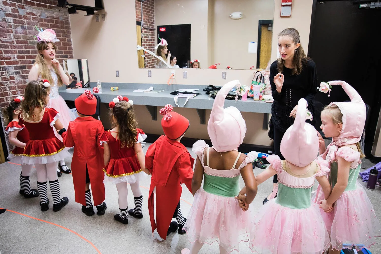 Lullaby league and lollipop kids wait for their time on stage.