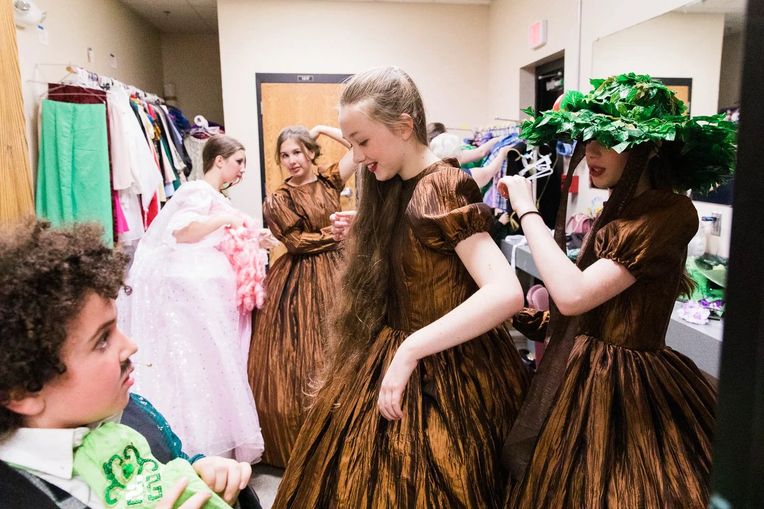 Girls get ready for their next scene of the Wizard of Oz.