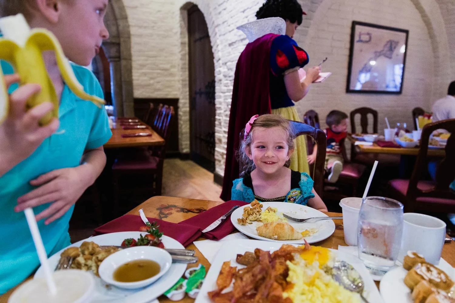 Four year old has character breakfast at Akershus Royal Banquet Hall.