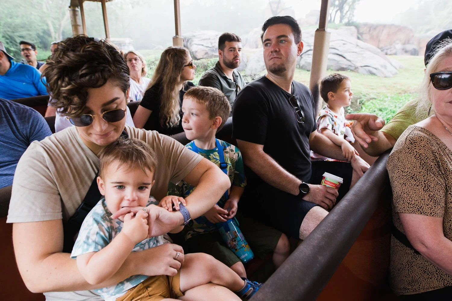 Family enjoys spotting animals on the safari at Disney's Animal Kingdom park.