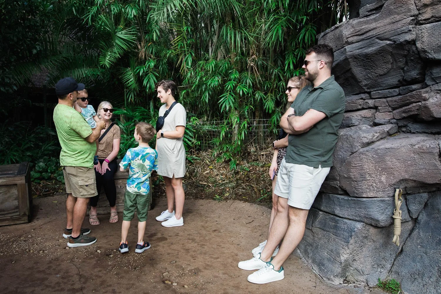 Family waits for the rest of their party on the Gorilla Falls trail at Animal Kingdom.